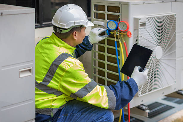 Professional Air Conditioning Repair technician working in Hillsborough, CA